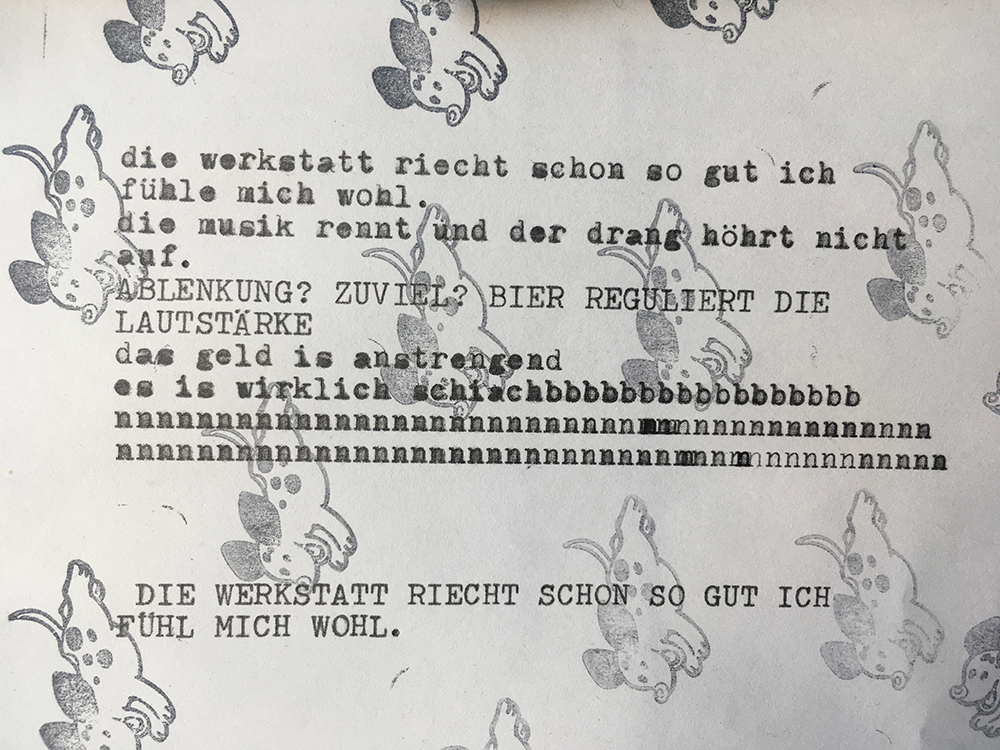 VIERROLLIGE UNTERFLANSCHLAUFKATZE MIT MECHANISCHEM VORSCHUB UND EINGEBAUTEM STIRNRAD-FLASCHENZUG
